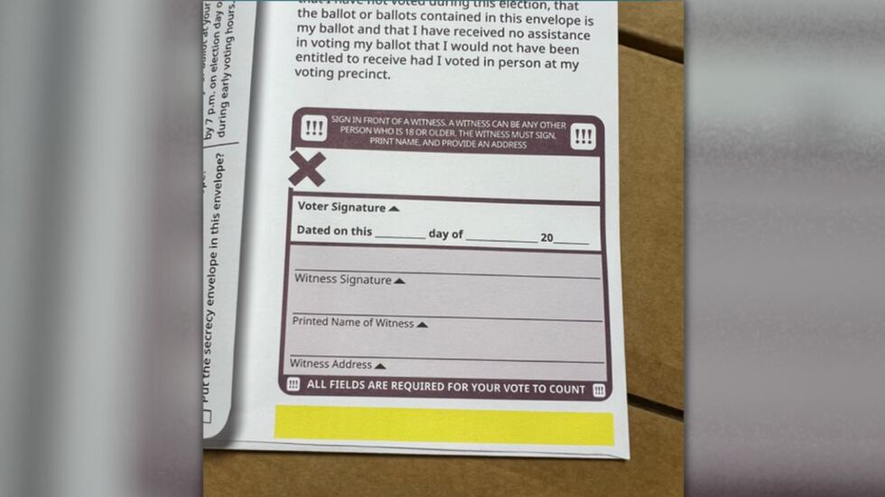 Corrected absentee ballots with yellow stripe mailed to Spartanburg County voters.