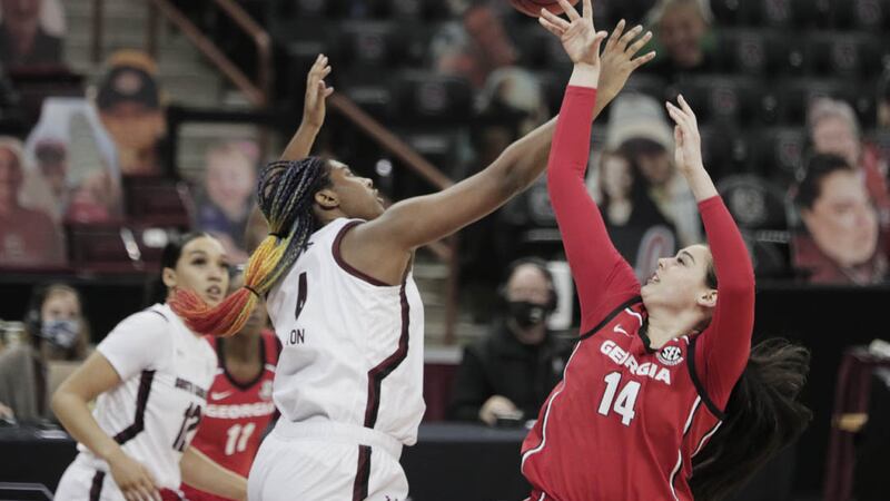 South Carolina Gamecocks forward Aliyah Boston (4) blocks Georgia Lady Bulldogs center Jenna...
