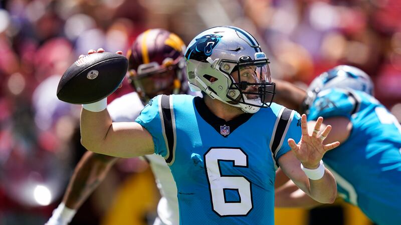 Carolina Panthers quarterback Baker Mayfield throws a pass during the first half of a NFL...