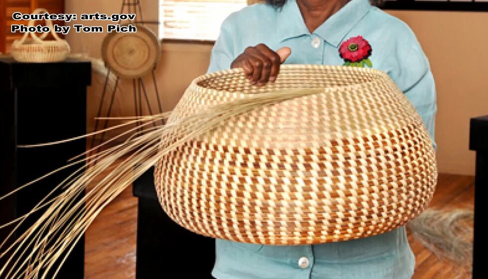 Jackson holding a Sweetgrass basket