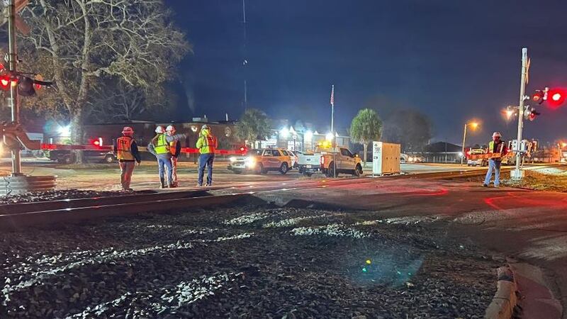 Rail crossings remain closed after train hits car on tracks, derails in Lake City
