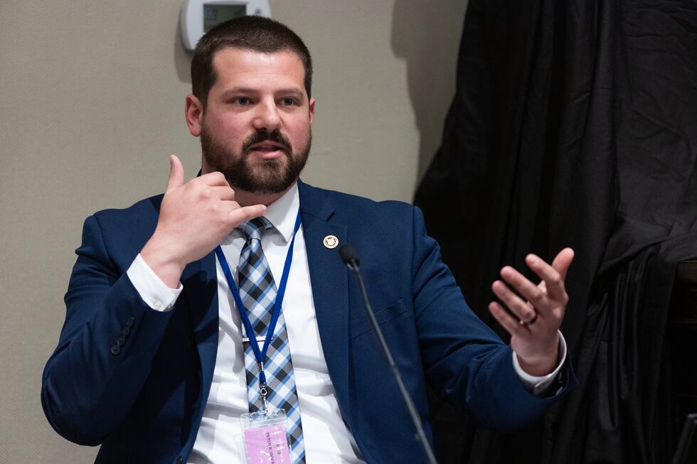 SLED Special Agent Peter Rudofski gestures how someone may have made a phone call using Alex...
