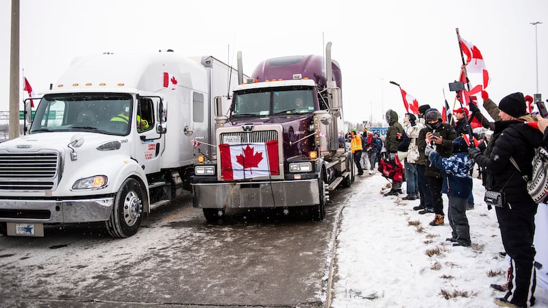Protestors show their support for the Freedom Convoy of truck drivers who are making their way...