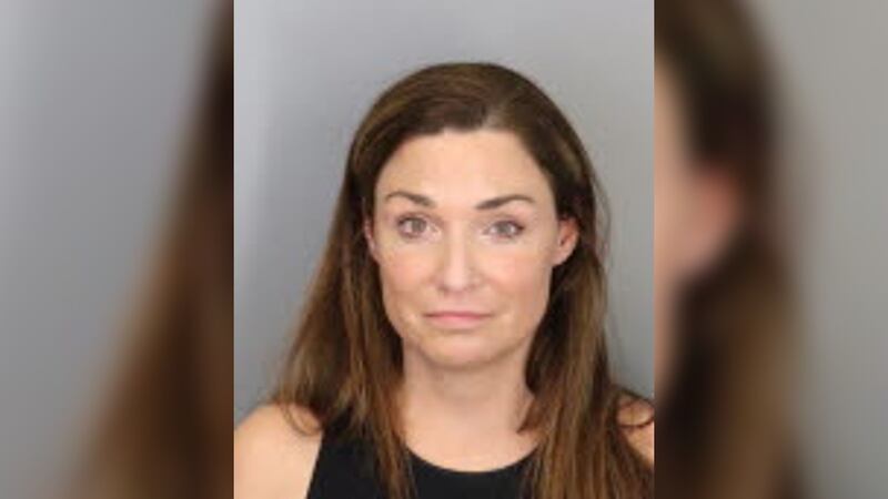 Stacie Denton, 40, was arrested and charged with domestic assault and elderly adult abuse.
