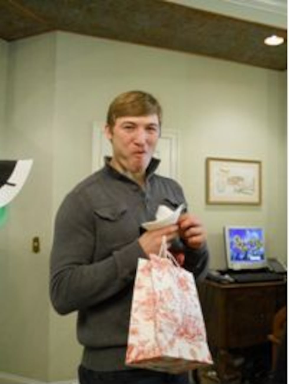 A Chocolate Walker enjoys the tasting at Herdashery at the 2013 Chocolate Walk.