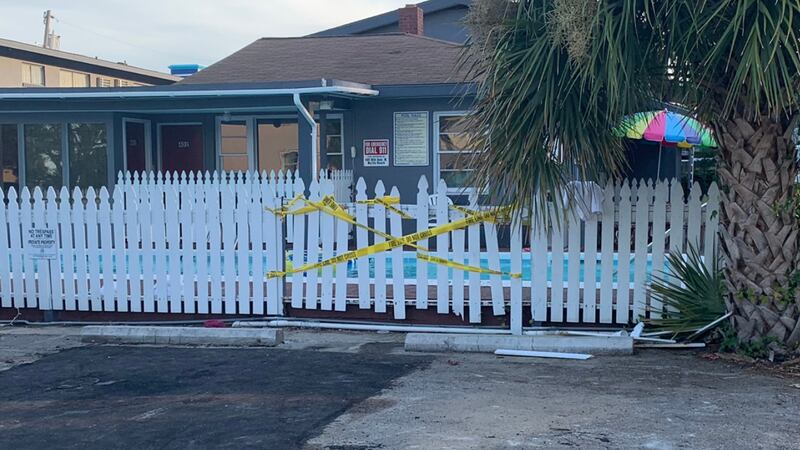 Crime scene tape ropes off a Myrtle Beach motel pool where a man drowned Wednesday night