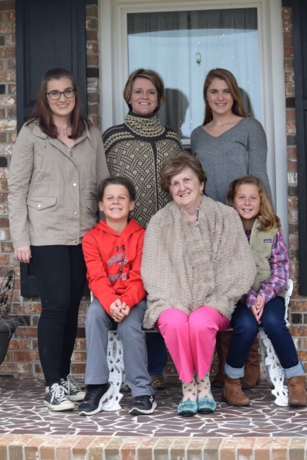 Mary Ann Elvington, center, and her grandchildren