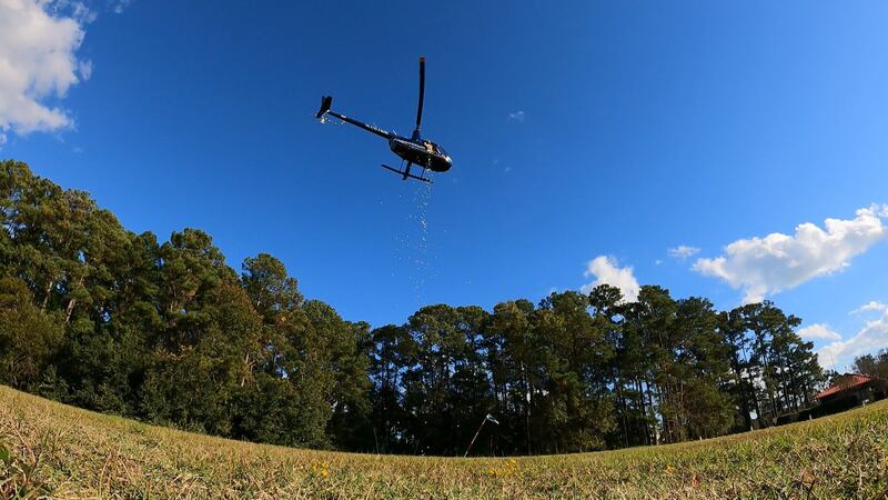 Over 1,000 golf balls dropped from helicopter in benefit for St. James High School band