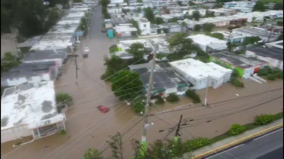 Aerial footage shows homes underwater in Puerto Rico after Hurricane Fiona struck.